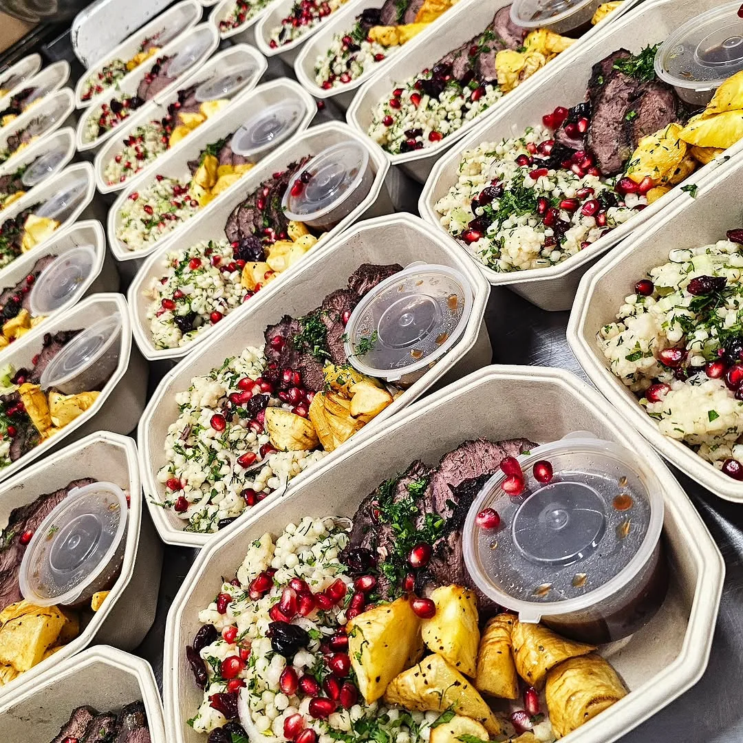 Sliced lamb with tabbouleh, pomegranate seeds and grilled pineapple