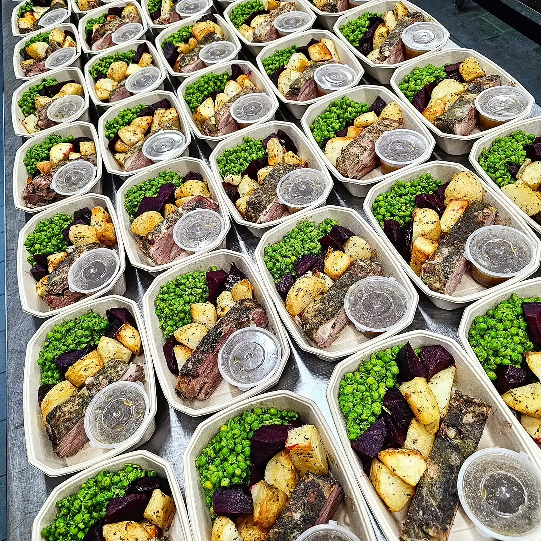 Sliced grass-fed beef with roasted potatoes, beetroot and garden peas