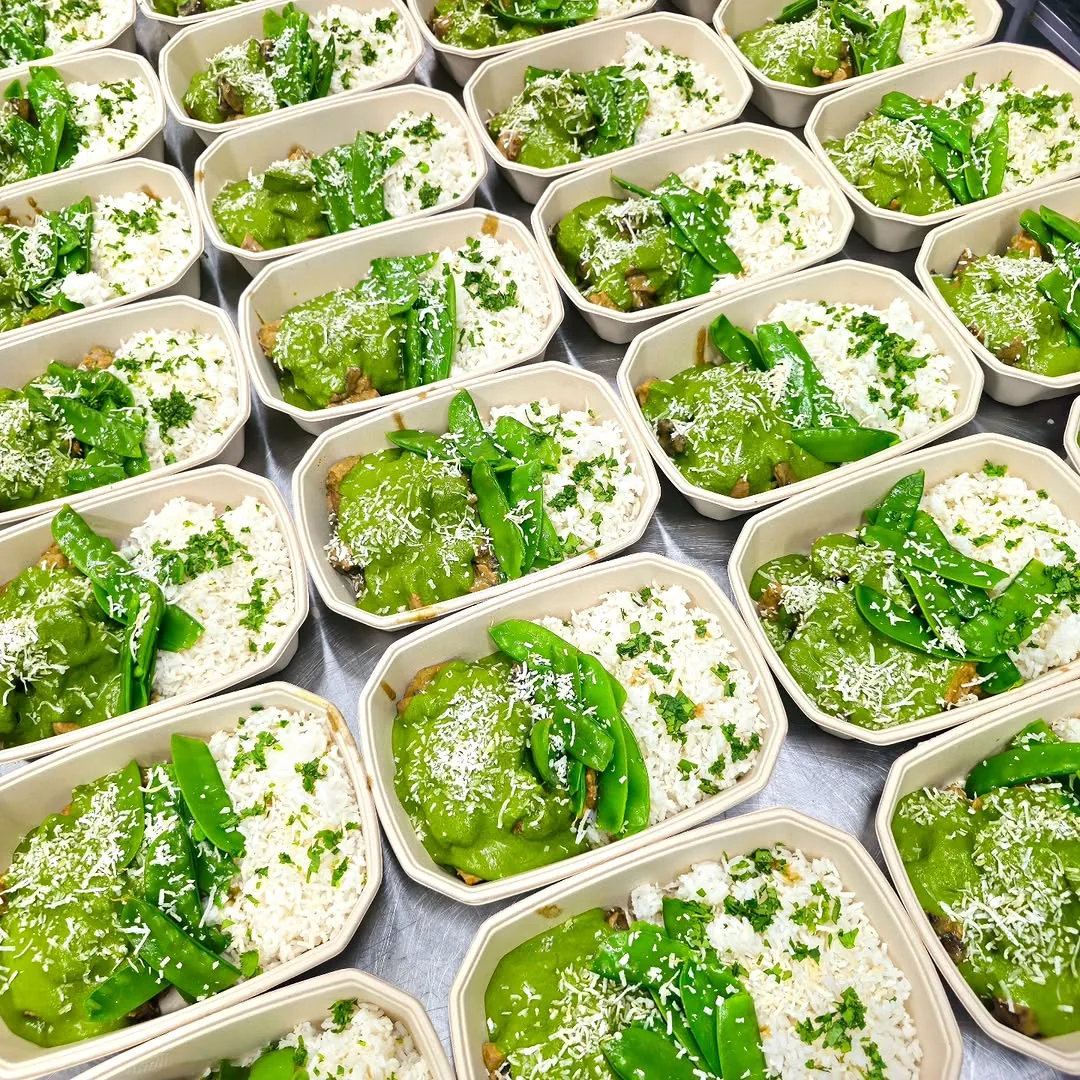 Thai green curry chicken with snow peas over jasmine rice