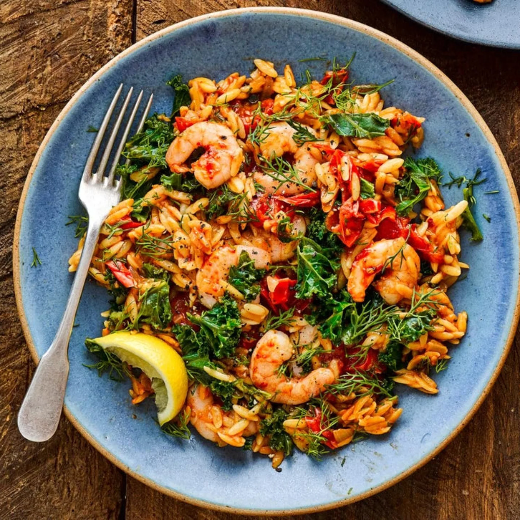 King prawns in rose harissa with slow-cooked orzo